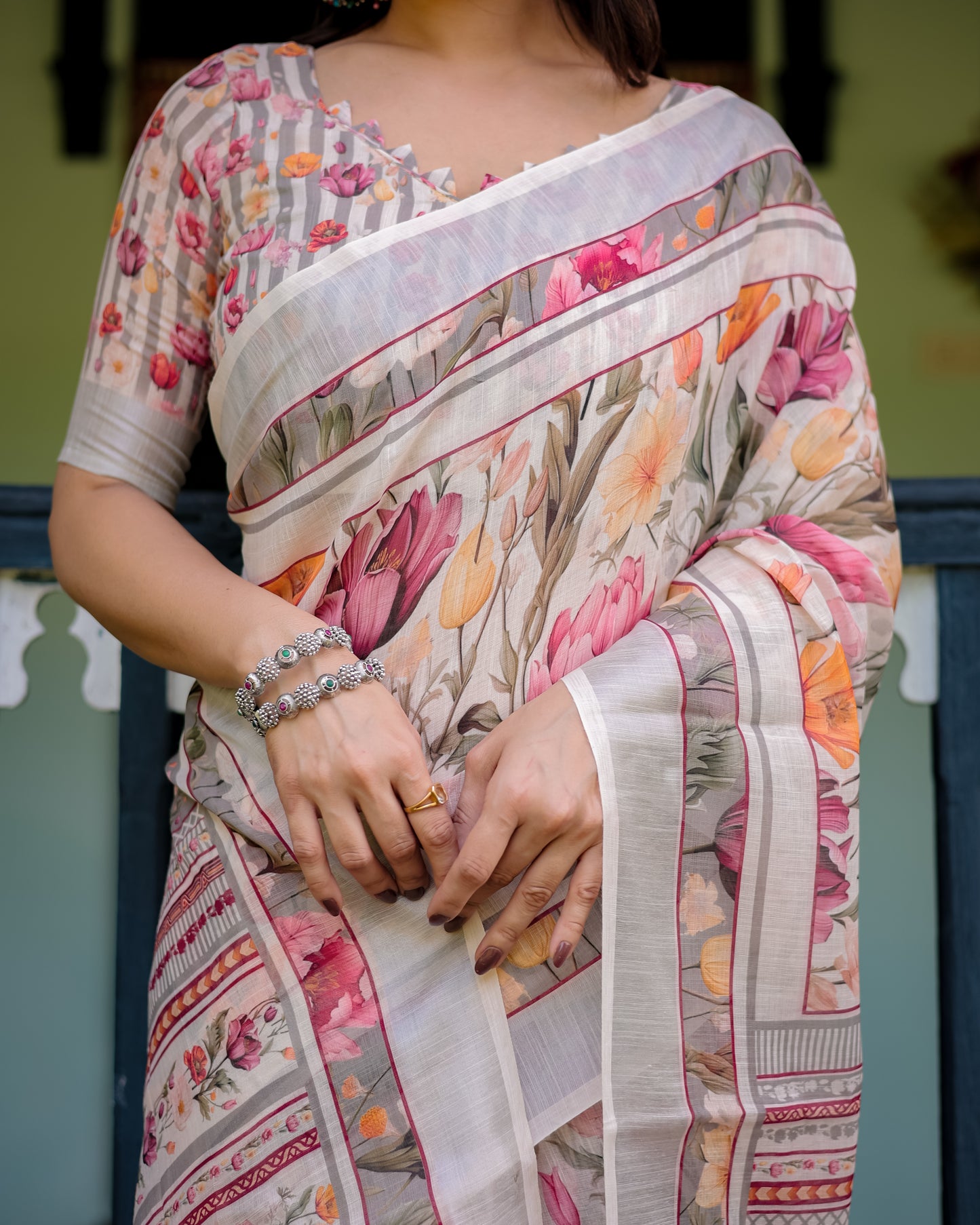 Graceful Off-White Linen Cotton Saree with Pink Floral Print & Zari Border