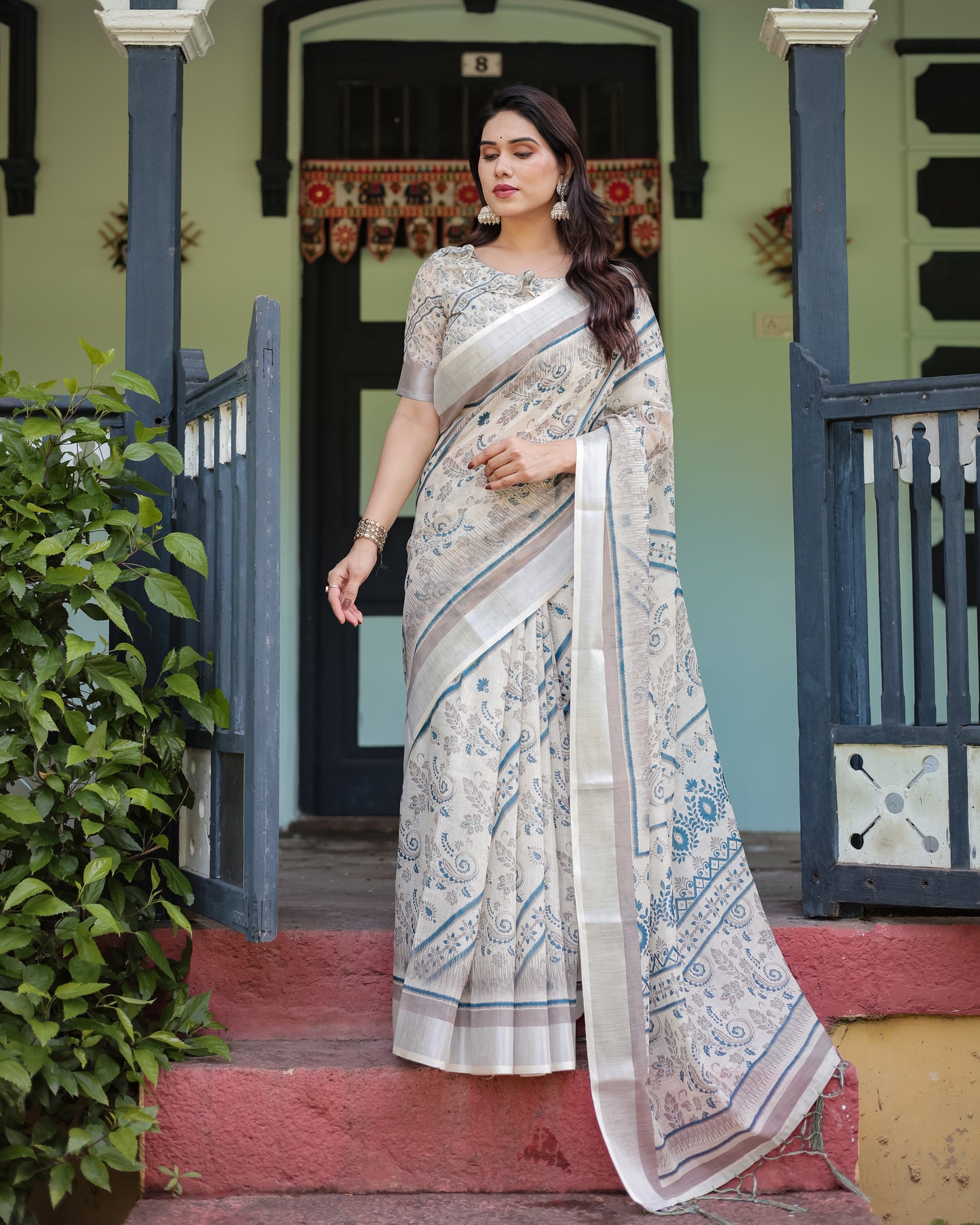 Sophisticated Off-White & Blue Linen Cotton Saree with Paisley Floral Print