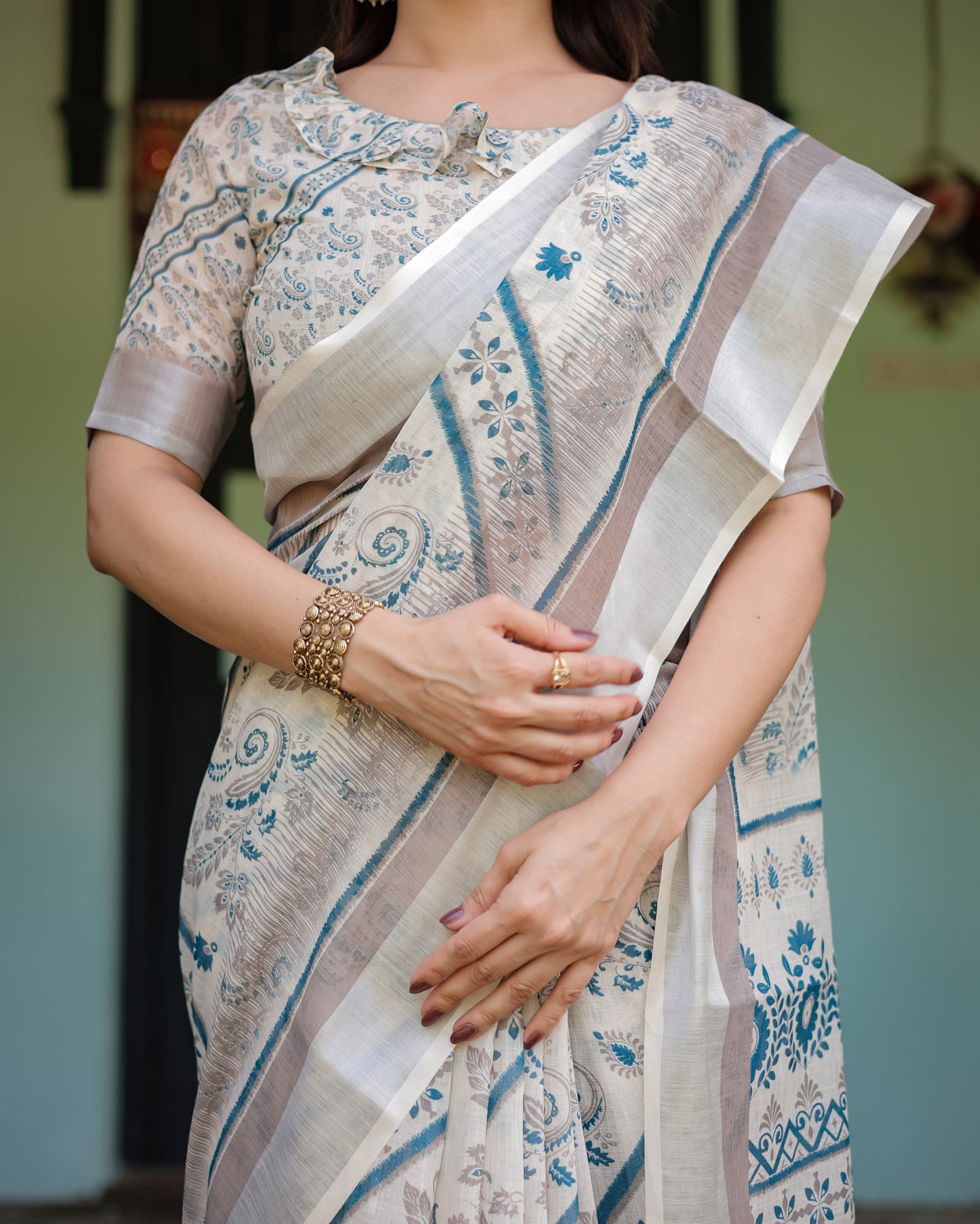Sophisticated Off-White & Blue Linen Cotton Saree with Paisley Floral Print