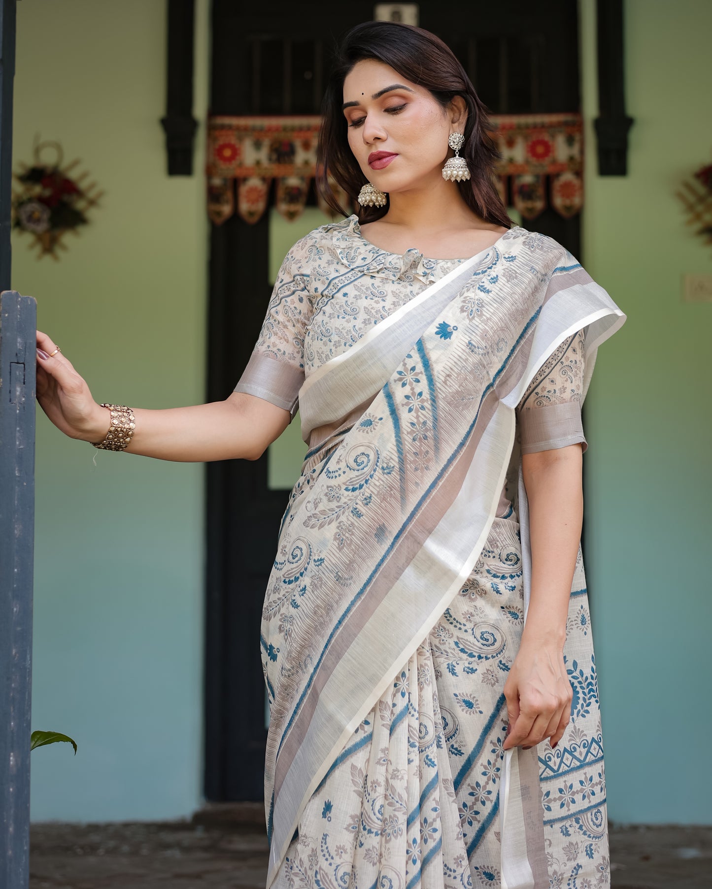 Sophisticated Off-White & Blue Linen Cotton Saree with Paisley Floral Print
